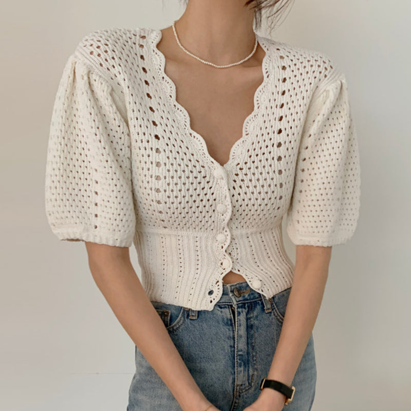 Kortermet cardigan i hullstrikk