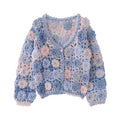 Heklet cardigan med blomster