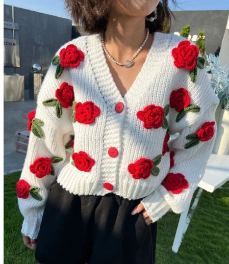 Strikkecardigan med rosedetaljer