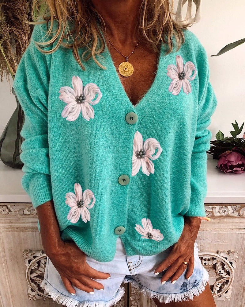 Finstrikket cardigan med blomster